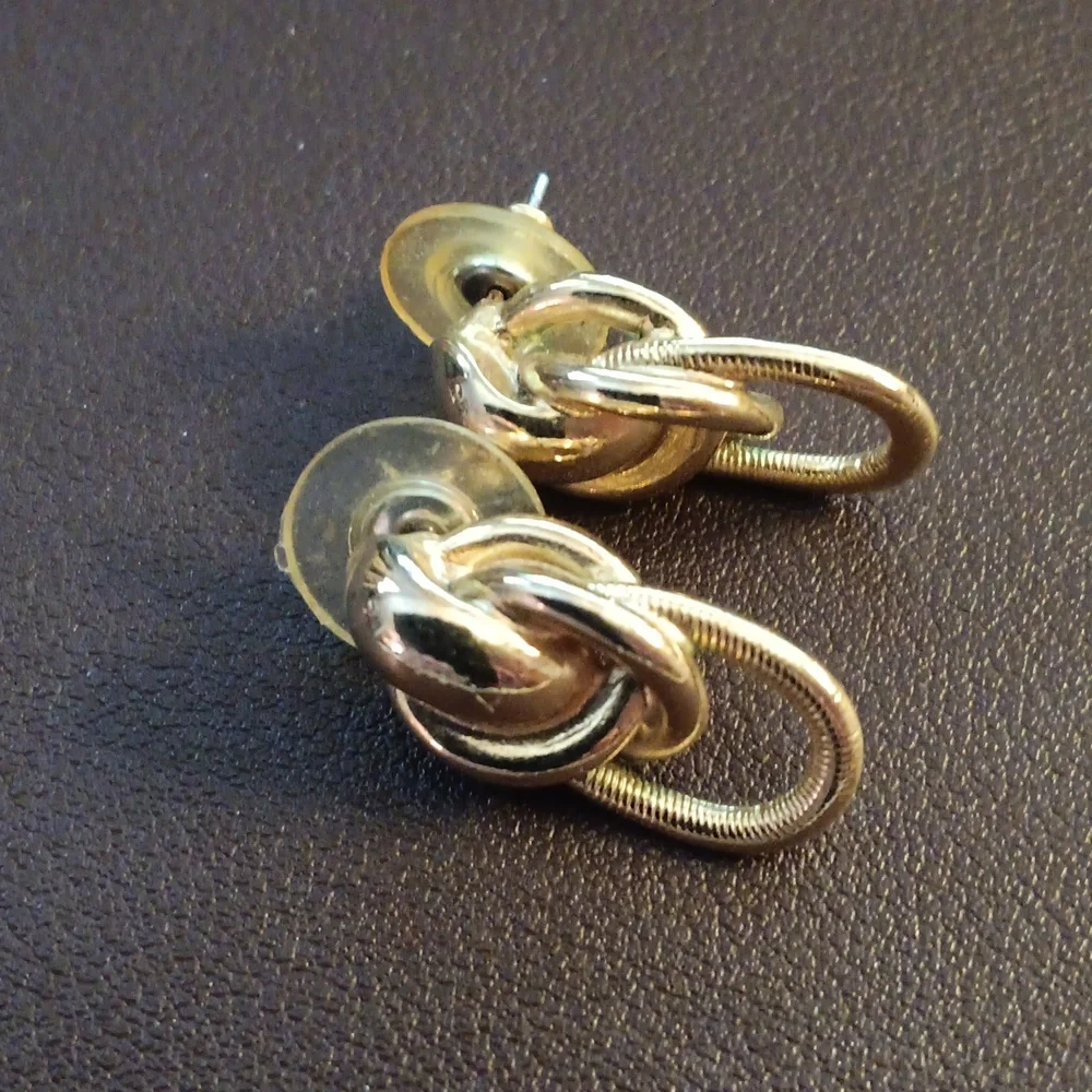 Elegant Gold and Silver Knot Earrings - Picture 3 of 4
